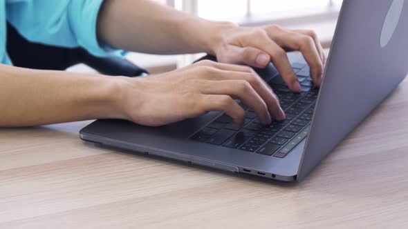 Close up hands businessman typing using laptop write coding programming, development web.