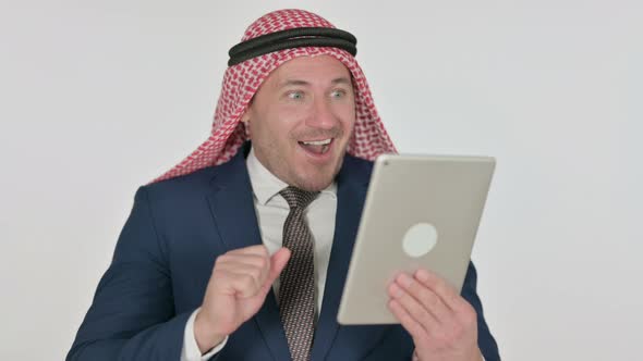 Arab Businessman having Loss on Tablet, White Background