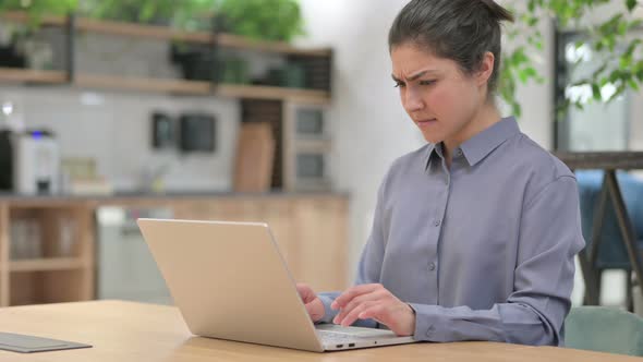 Young Indian Woman Having Loss While Using Laptop