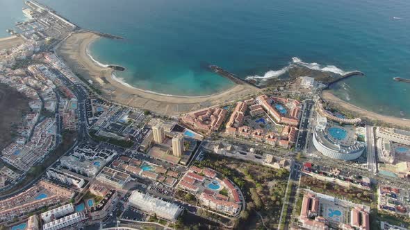 Aerial shot of Playa de Las Americas at Costa Adeje, Tenerife, Spain