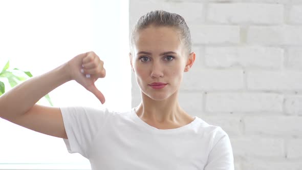 Thumbs Down By Beautiful Woman Portrait