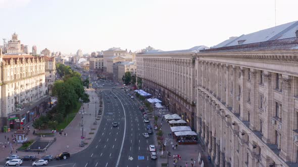 Street with Historical Buildings and Car Traffic