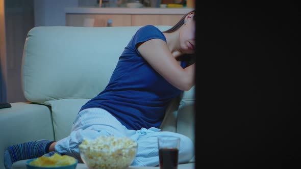 Portrait of Young Woman Asleep on Couch