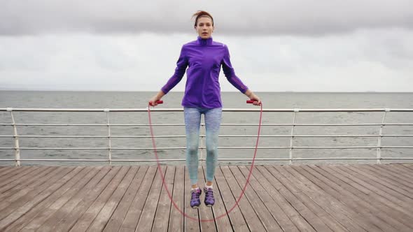 Young Woman Working Out on the Jump Rope