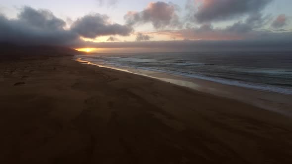 Aerial view of Cofete beach at sunset in the National Park of Jandia.