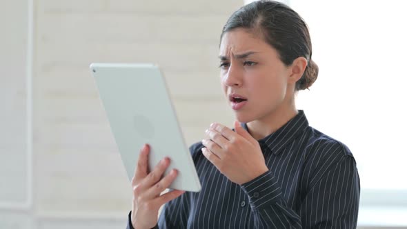 Young Indian Woman Having Loss on Tablet