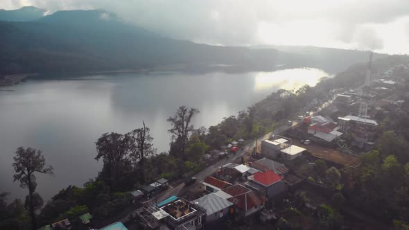 Flight Overlooking the Sacred Lakes of Tamblingan and Beratan Located High in the Mountains in the