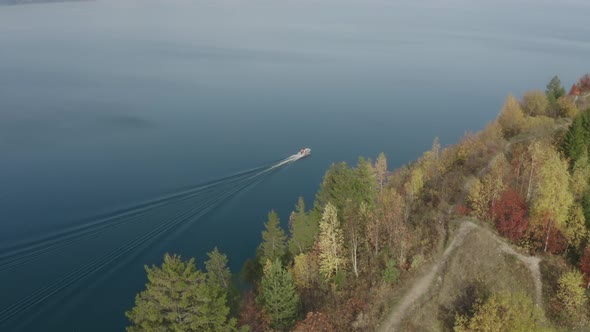 Motor Boat Is Sailing Fast Along Cape