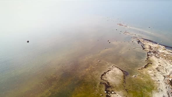 Abstract aerial view of algae beach at coast side in Forby on the island of Vormsi in Estonia.