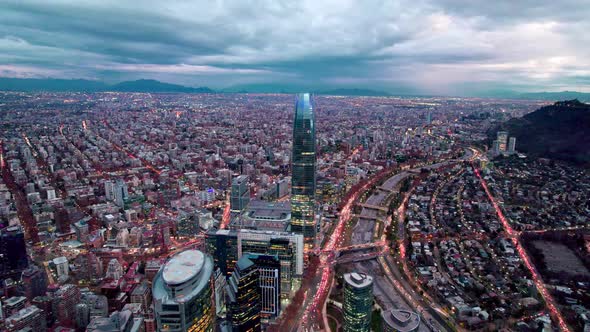 Aerial view dolly in of the towers in the business center in Santiago, Chile. Clear city after rain