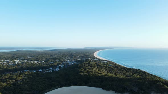 High drone view looking over the Carlo Sand Blow out towards Fraser Island Queensland Australia