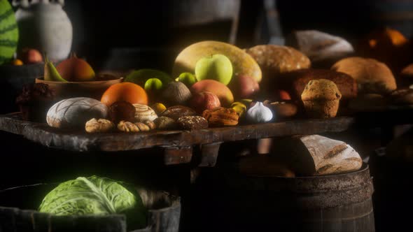 Food Table with Wine Barrels and Some Fruits Vegetables and Bread