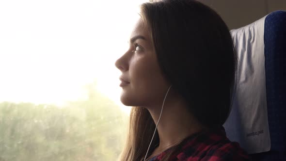 Pensive Girl Travels By Train