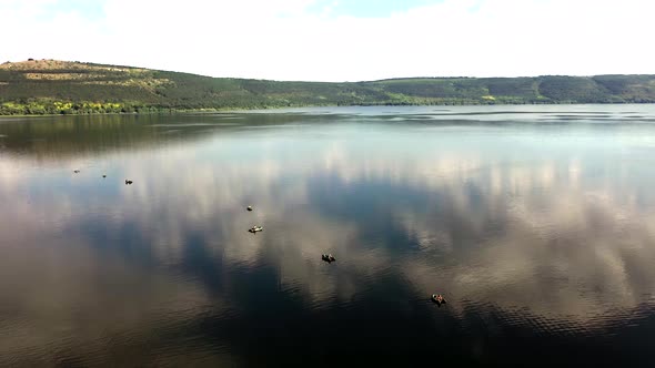 aerial view of fisherman at the boat on river. Fisherman life style.