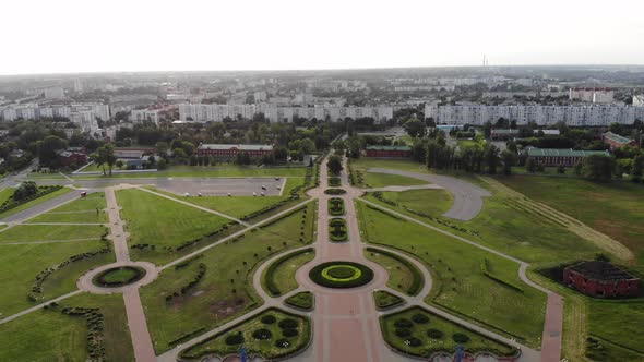 A Panorama of the City with Beautiful Walkways in the Green Recreation Area and a Blue Dome of the