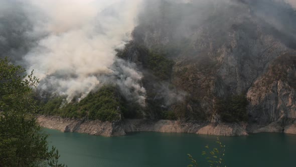 Wild Fire Over Mountain Forest Near Lake Piva in Montenegro in August of 2021