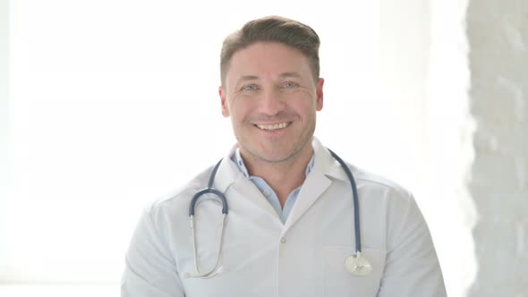 Portrait of Male Doctor Smiling at Camera