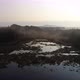 Aerial View of a Lake with Aquatic Plants at Sunrise 4K - VideoHive Item for Sale