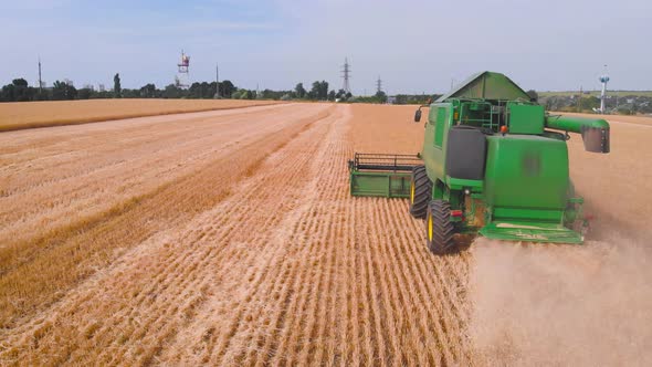  Impressive Flight Over a Working Combine Harvesting Tons of Ripe Barley