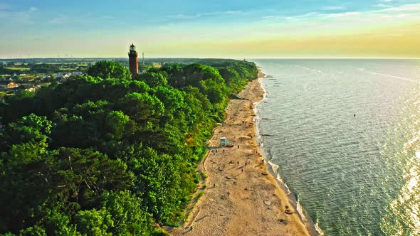 Lighthouse on sunrise by Baltic Sea, Poland, aerial view