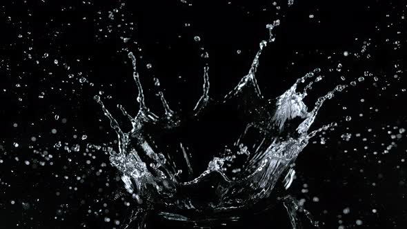 Super Slow Motion Shot of Water Crown Splash at 1000Fps Isolated on Black Background alt