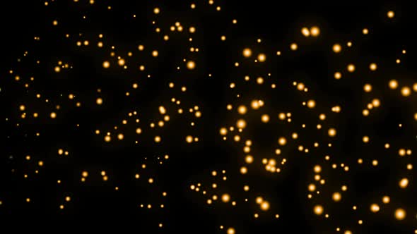 Animation of multiple glowing gold spots of light moving in hypnotic motion on black background