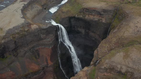 Aerial View of Haifoss Waterfall Crashing Against the Rocks in Iceland