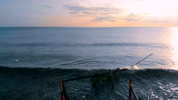 Aerial Video of the Sea Coast and the Old Rusty Boat Dock. Ocean View, Waves of the Mediterranean