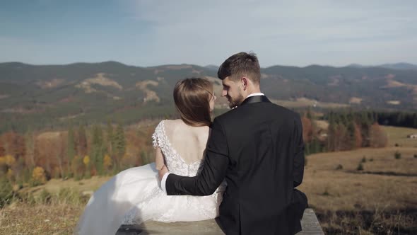 Newlyweds, Caucasian Groom with Bride on Mountain Slope, Wedding Couple, Happy