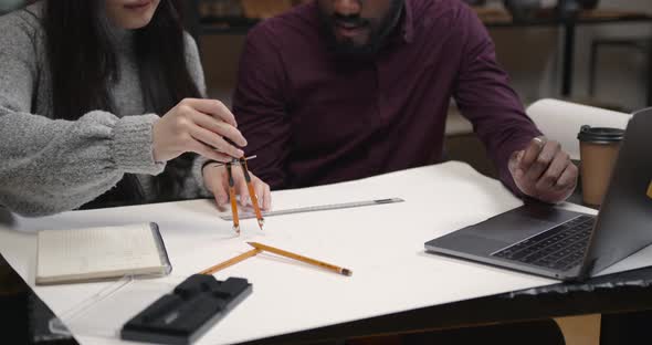 Corean and African Architects Doing Sketch Together