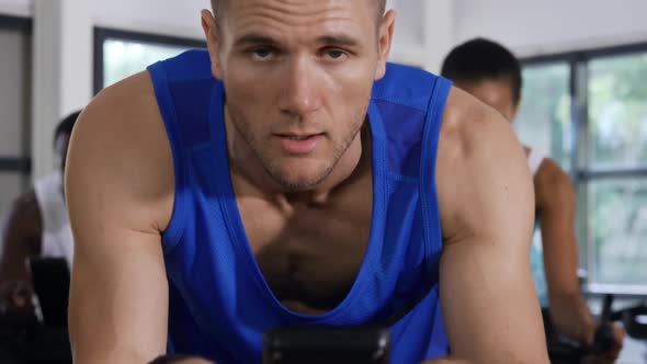 Working out on exercise bikes at a gym