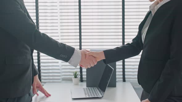 People shake hand with human resources manager businessman after apply recruit and hire at workplace