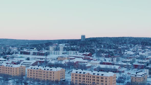 Soft panoramic aerial rise over Östersund skyline i Sweden