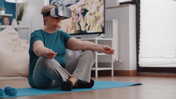 Old Woman Wearing Vr Glasses and Doing Meditation