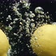 Closeup of Lemons and Limes Falling Into the Water in Slow Motion - VideoHive Item for Sale