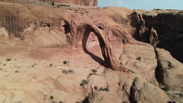 Aerial drone views of Corona Arch, west of Moab, Utah.