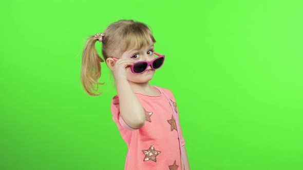 Positive Girl in Pink Blouse and Sunglasses Dancing and Posing, Chroma Key