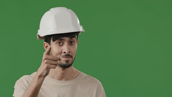 Arab Hispanic Man Engineer Mechanic Wears Special Helmet Raises Index Finger Warns you Be Attentive