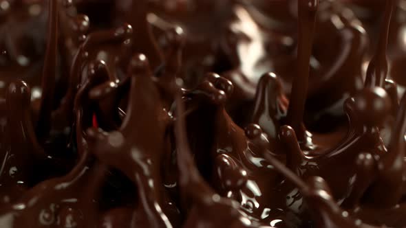 Super Slow Motion Detail Shot of Splashing Melted Chocolate at 1000 Fps