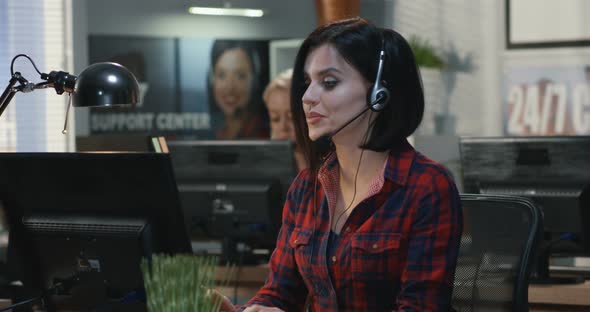 Young Woman Working at Her Desk