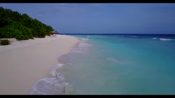 Aerial drone sky of relaxing bay beach journey by aqua blue ocean with white sandy background of a d