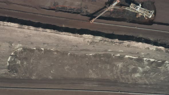 Flight Over the Quarry with Heavy Bucket Wheel Excavators Mining a Coal