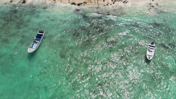 Boats Floating on the Waves near the Beach in the Perfectly Clear Seawater Cartagena Colombia