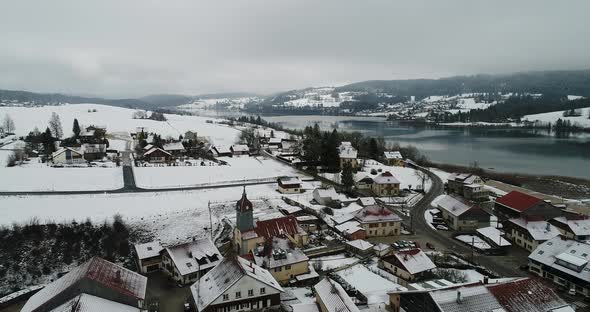 Village of Saint-Point-Lac in Doubs in France seen from the sky alt