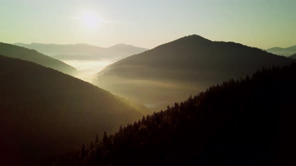 Mountain Peaks and Morning Sky with Smooth Moving Clouds