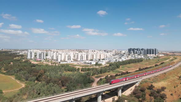 train on a bridge entering to southern district city at israel named by netivot