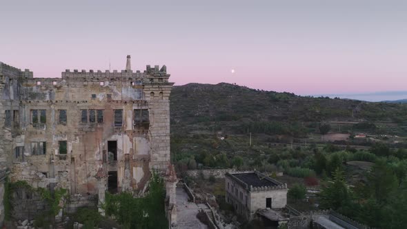 Drone aerial panorama of Termas Radium Hotel Serra da Pena at sunset in Sortelha, Portugal