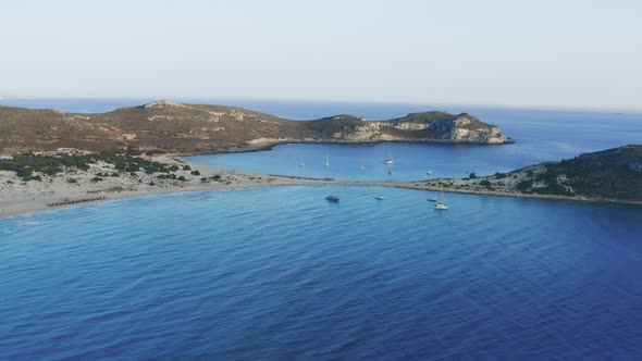 Aerial flying over Elafonisos Greek island, Simos double sandy beach