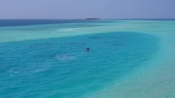 Aerial drone tourism of lagoon beach by blue ocean and sand background