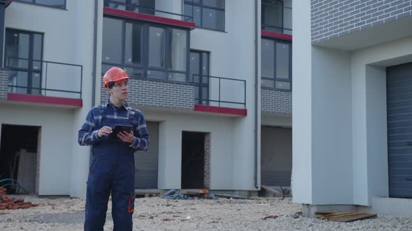 Worker Uses His Tablet Fot the Project